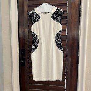 Very nice off white dress with lace inserts.